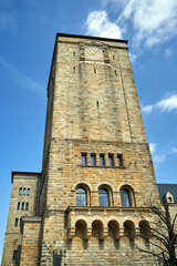 Fototapeta na wymiar Stone clock tower of a historic Imperial castle in Poznan