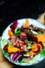 Tuna steak with pear salsa .