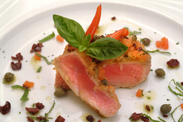 Italian food recipes, Tuna with Marinara sauce  of anchovies in oil, capers, onion, peppers.