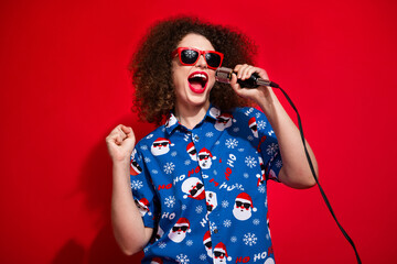 Photo portrait of lovely young lady singing mic voice song dressed stylish blue print x-mas garment...