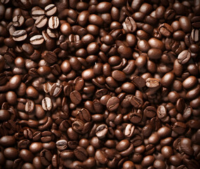 Obraz premium Brown roasted coffee beans background