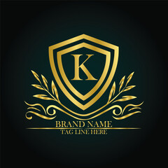 K luxury letter logo template in gold color. Elegant gold shield icon. Premium brand identity emblem. Royal coat of arms company label symbol. Modern vector Royal premium logo template vector
