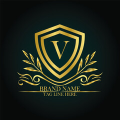 V luxury letter logo template in gold color. Elegant gold shield icon. Premium brand identity emblem. Royal coat of arms company label symbol. Modern vector Royal premium logo template vector