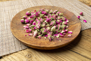 Obraz na płótnie Canvas Dry Rose Buds, Roses Petals for Pink Flower Tea, Dried Persian Rosebuds, Rose Buds Textured Flowers