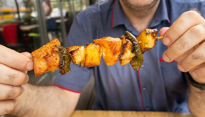 Poultry Shish Kebab, Barbecue Shashlik with Meat and Vegetables, Fruits, Peppers, Onions and...