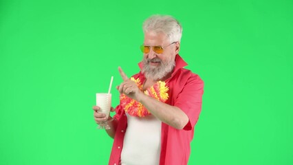 Portrait of senior hipster on Chroma key green screen, man in flower wreath drinks cocktail and chills at the party. Advertising area, workspace mockup. - Powered by Adobe