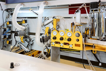 Automated machine for gluing ring tape.