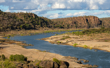 The Olifants river flowing slowly through the magnificent Kruger National Park in South Africa
