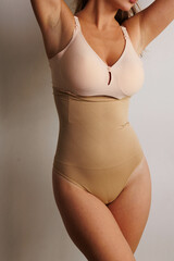 Plus size pretty model in correcting figure (body) stretch beige shorts.
Beautiful lady with big...