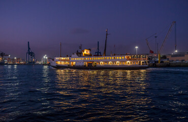 Captured the enchanting night ambiance of Istanbul's iconic Eminonu Pier, where the shimmering...