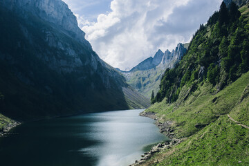 Nestled within a tranquil landscape, the lake unfolds like a liquid mirror reflecting the surrounding world.