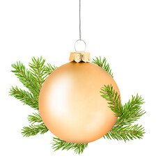 Christmas ornament in gold color with fir branches hanging on a white isolated background