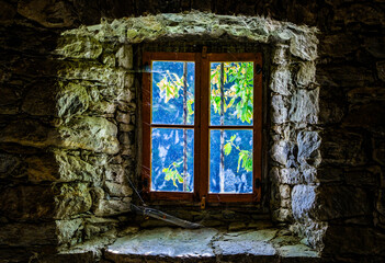 Fototapeta na wymiar old window at a farmhouse