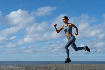 athletic brunette girl doing fitness doing exercises leading a healthy lifestyle