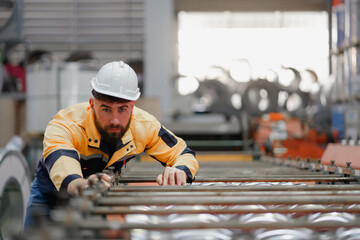 two professional engineer,worker,technician use clipboard discuss work, walk in steel metal...