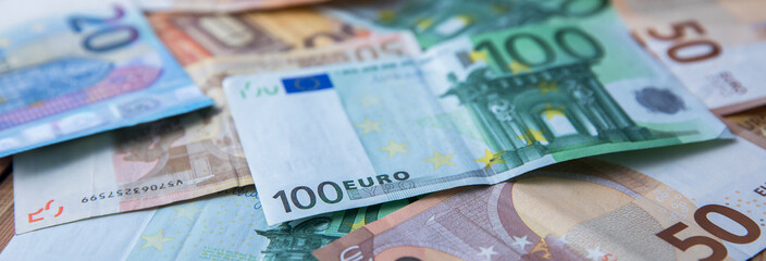 Fototapeta na wymiar Many euro banknotes