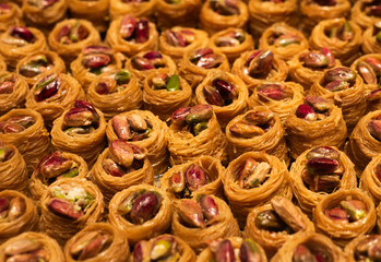 Turkish sweet baklava on tray. Traditional Baklava from Gaziantep, Turkey. Baklava with pistachio.
