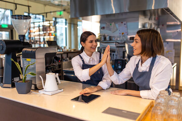 Coffee shop assistants feeling good at their working place