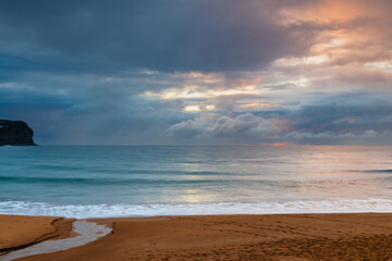Wet weather sunrise seascape