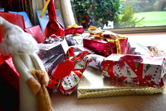 Close-Up of Multies Presents and gift boxes under the Christmas tree in the Christmas holiday.