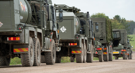 convoy of British army M.A.N. HX58 unit support tankers in action on a military exercise. Wilts UK