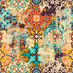 Traditional Oriental pattern, vector illustration. Ornament in retro colors. Seamless colorful floral hand drawn pattern with an effect of attrition. 