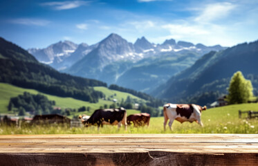 Fototapeta na wymiar Empty rustic old wooden boards table copy space with cows grazing on alpine meadow in background, some mountains at distance. Dairy milk product display template. Generative AI