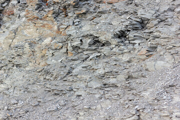 scree from the mountain on the shore stones from opoka, close-up texture
