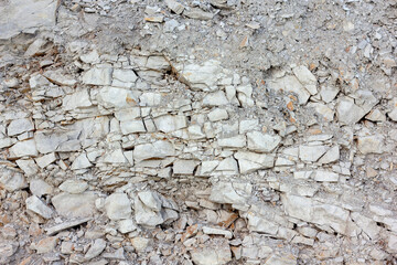 scree from the mountain on the shore stones from opoka, close-up texture