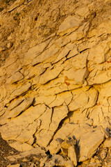 scree from the mountain on the shore stones from opoka at the golden hour, close-up texture