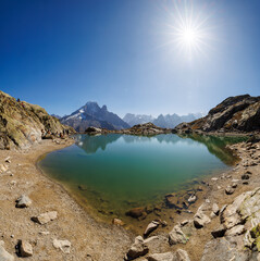 mountain lake Lac Blanc in Chamonix with mountains of the Mont Blanc Massiv in the distance