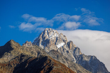 peak of Aiguille Le Chardonnet in autumn