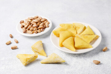 Traditional Turkish sweet dessert pestil or muska dried fruit pulp snack.