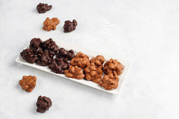 Handmade chocolate with pistachios, dark and milk chocolate pieces.