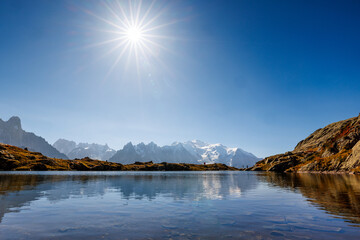 mountain lake Lac Blanc in Chamonix with mountains of the Mont Blanc Massiv in the distance
