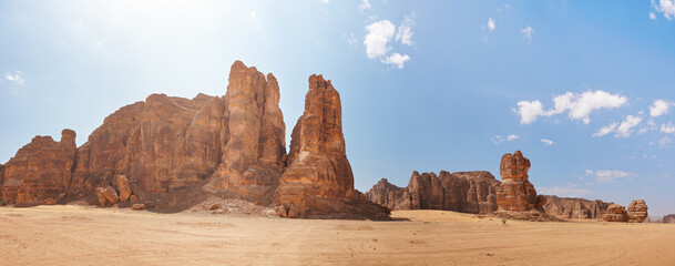 Rocky desert formations with sand in foreground, typical landscape of Al Ula, Saudi Arabia. High...