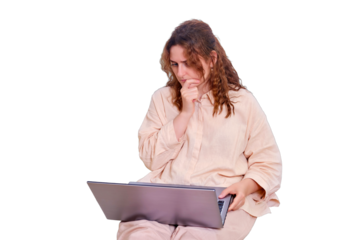 Sad woman student reflected while sitting on the bed with a computer, isolated on a white background. Doubting woman while studying online from home