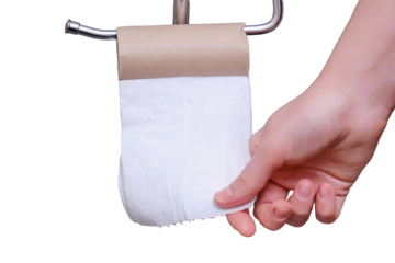 Man sits in the toilet and holds an empty roll of run out of toilet paper, isolated on a white background