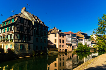 Traditional fachwerk houses on canals district of Strasbourg town in eastern France
