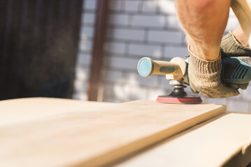 Grinding of an oak board with an angle grinder