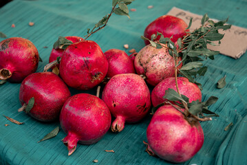 some fresh red pomegranate at a farmer's market