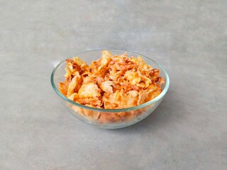 spicy and sweet corn chips. crushed corn chips.