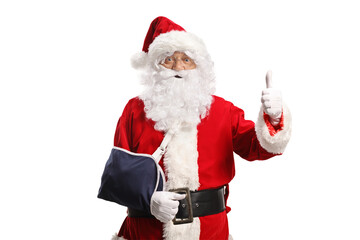 Santa Claus with an arm injury wearing a sling and gesturing thumbs up