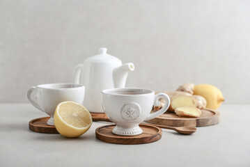 Ginger tea with lemon in a white cups