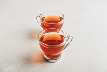 Tea  in a glass cups in row