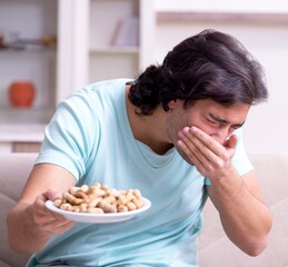 Young man suffering from allergy