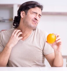 Young man suffering from allergy