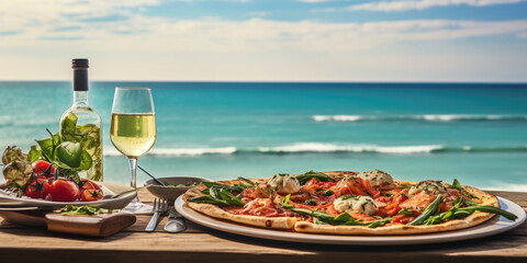 Mediterranean pasta and salad with glass of wine turquoise ocean in the background 