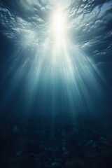 blue underwater with rays of sun background, under water turquoise wallpaper