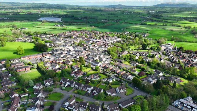 Aerial video of Residential housing in Doagh Village County Antrim Northern Ireland